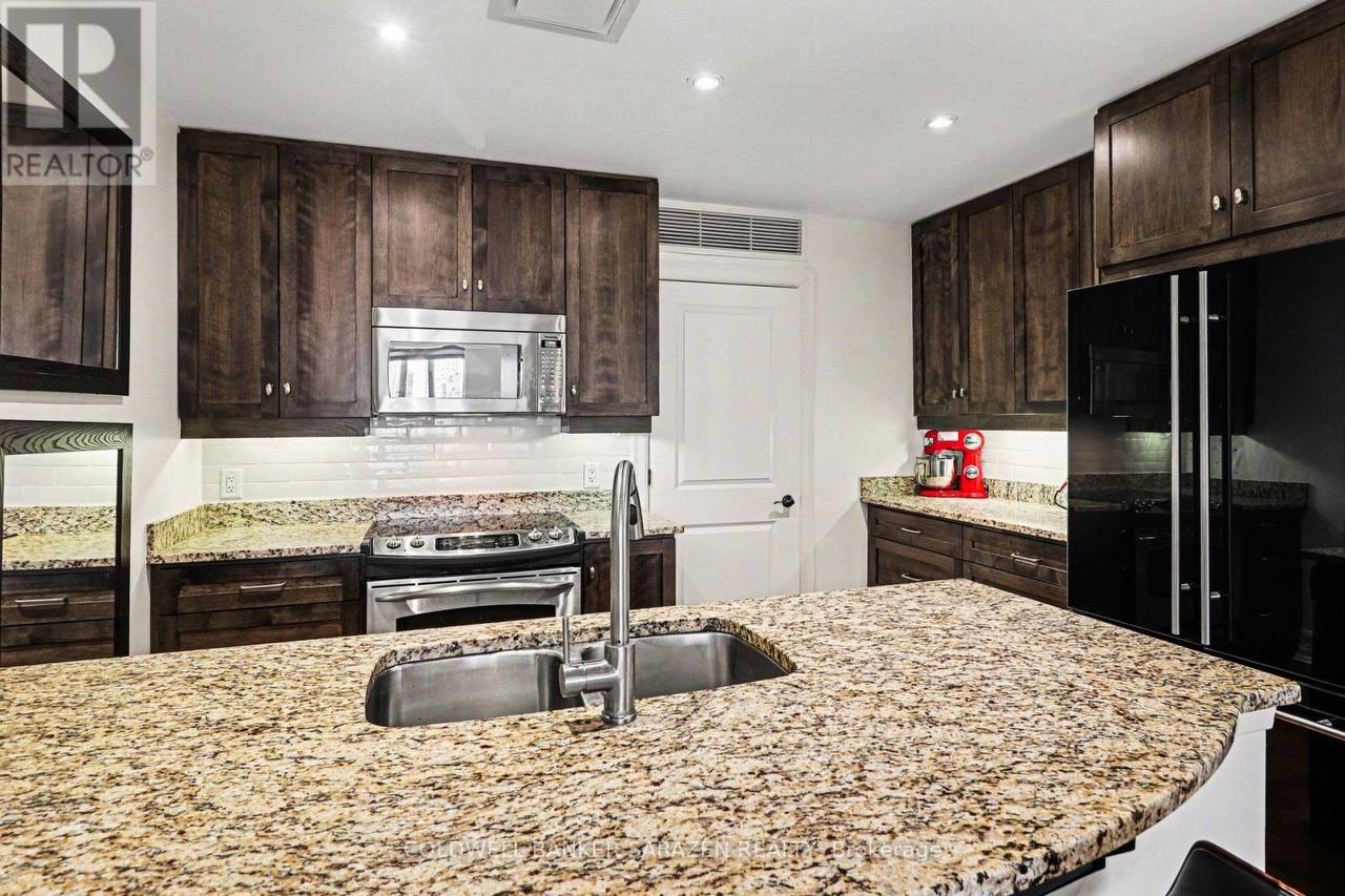 Kitchen of unit 701 — directly above Lavoie's original 1747 hearth